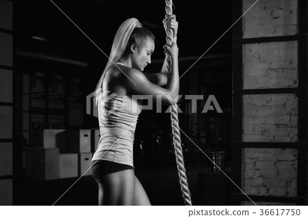 Female fitness athlete exercising 36617750