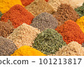 Heap different Asian Spices lies on wooden background. Spice and seasoning. Various fragrant spice market. Assortment spices and herbs for cooking 101213817