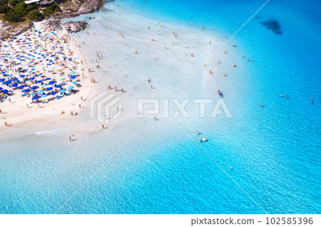 Aerial view of amazing sea coast. Top view of white sandy beach 102585396