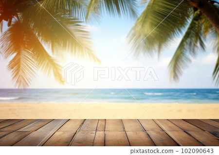 Empty wooden table on a beautiful blured tropical beach background. Summer holiday background for product display 102090643