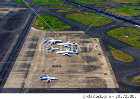 Airplane parked at international airport 105725805