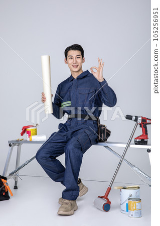 millennials and gen z, korean asian young man, site staff with drill 105256951