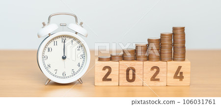 Happy New Year with vintage alarm clock and flipping 2023 change to 2024 block. Resolution, Goals, Plan, Action, Money Saving, Retirement fund, Pension, Investment and Financial concept 106031761