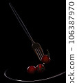 Fork with small tomatoes on a black background, on a plate. 106387970