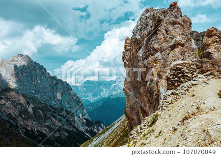 landscape with mountains, clouds and rocks 107070049