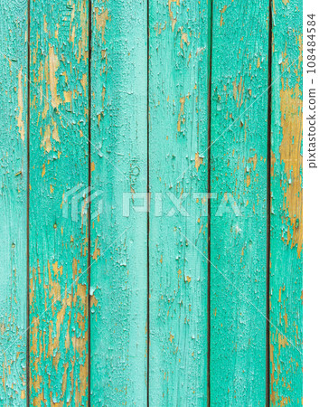 paint peeling off a wooden background 108484584