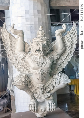 Traditional white Garuda wooden statue in Thailand 108141319