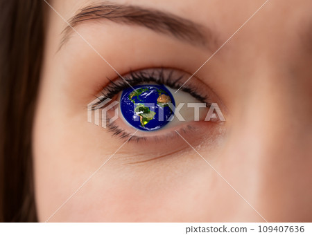 Environmental issues: Macro photography of a woman, iris, and eyes with the earth reflected in her eyes, close-up, AI-generated image 109407636