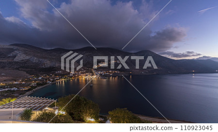 Panorama showing Amorgos island aerial day to night timelapse from above. Greece 110923045