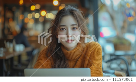 AI-generated content. Young woman sitting at an outdoor cafe, speaking to her laptop camera, explaining something, drinking coffee. 111573061