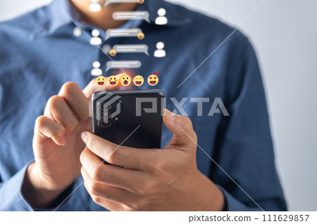 Businessman receiving multiple social media notifications on smartphone. social media concept. 111629857