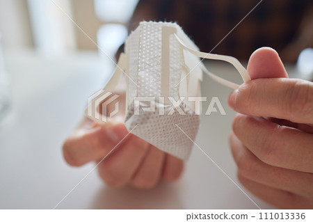 brewing process,a bag filled with boiling water for drip coffee in a cup,top view. 111013336