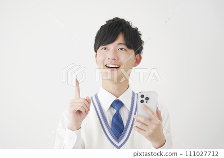 High school boy flashing with a smartphone, white background 111027712