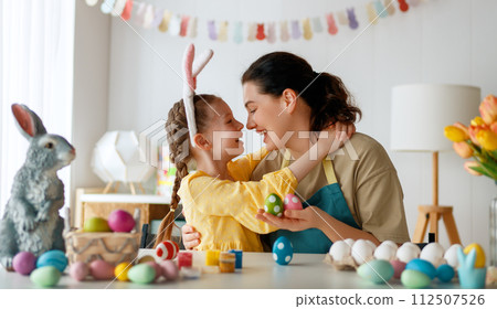 family preparing for Easter 112507526