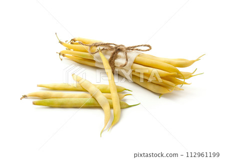 Bunch and several pods of flat runner bean heap isolated on white background. . 112961199