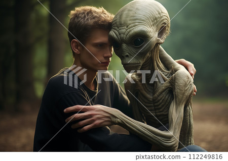 Human and alien encounter in forest setting 112249816