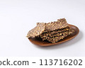 healthy seed crackers on white background 113716202