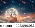 Conceptual night scene with a superhero with cape standing brave on a mountain peak searching determined at horizon with hand up to forehead. Powerful hero overcoming obstacles and reaching success 113090868