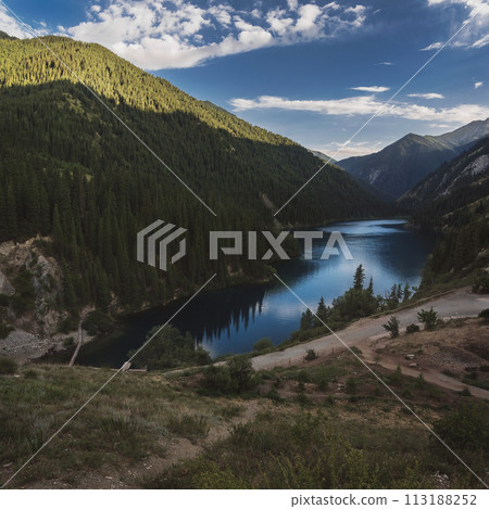 beautiful panoramic landscape with Kolsai Lake in Tien Shan mountains in Kazakhstan in summer. Top view from a drone 113188252