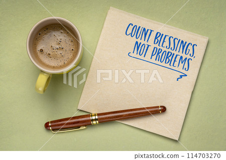 count blessings, not problem - gratitute and positivity concept, inspirational note on a napkin 114703270