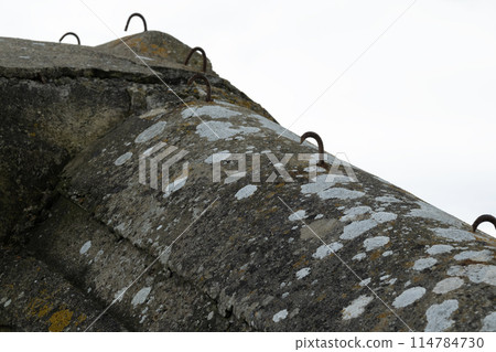 Normandy France D-Day stronghold bunker at Utah beach area with iron holds. WWII Utah Beach. Veterans Day rememberance. High quality photograph 114784730