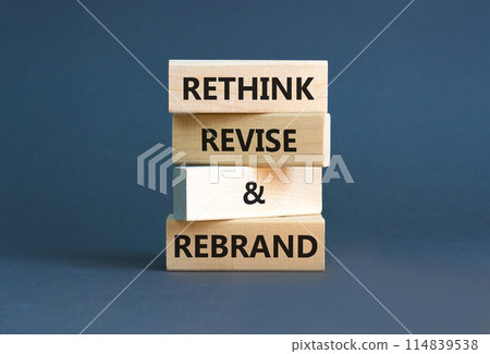 Rethink revise rebrand symbol. Concept word Rethink Revise and Rebrand on beautiful block. Beautiful grey background. Business brand motivational rethink revise rebrand concept. Copy space. 114839538