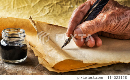 Wrinkled Hand Holding a Quill Pen on an Empty Parchment in The Act of Writing - Generative Ai 114023158