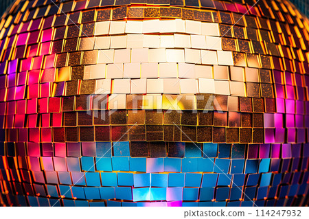 A disco ball is suspended from the ceiling at party in nightclub, reflecting the lights and creating a festive atmosphere 114247932