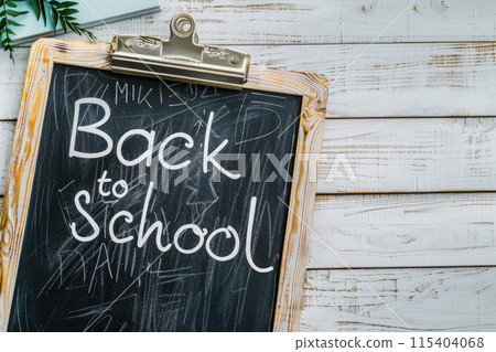 blackboard school with phrase "Back to school" written on surface. Ai generative 115404068