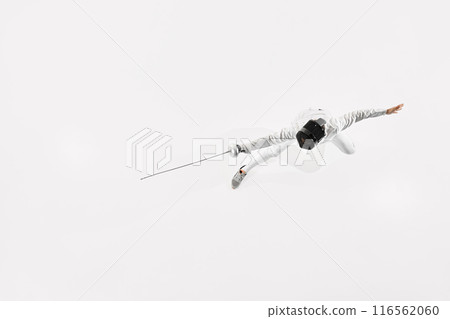 Nature of sport. View from above, fencer lunges with precision, his epee extended against white studio background. 116562060