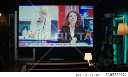 Smart TV in empty living room displaying breaking news coverage with anchorwoman talking about medical AI uses, zoom in shot. Big television display showing streaming channel for cord cutters 116578932