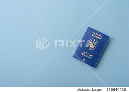 Biometric Ukrainian passport on a blue background 116640986