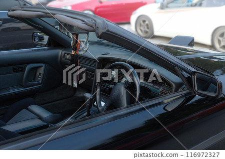 27.07.2024 Novosibirsk, Meet, Targa Car interior Toyota Supra a70 1990 in Black, pop-up headlights 116972327