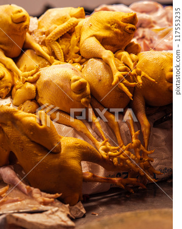 Freshly Plucked Chickens at a Market Stall 117553235