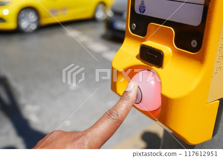 close up of crossing signal button  117612951