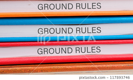 Conceptual ground rules symbol. Copy space. GROUND RULES words written on the ends of notebooks lying on top of each other 117893746