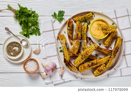 bbq corn ribs on a plate, top view 117978099