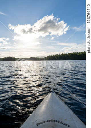 A beautiful view looking out from a kayak on Conway Lake in New Hampshire. 118764540