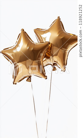 Two gold balloons with stars on them 118921252