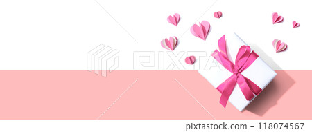 Gift box with pink paper hearts 118074567