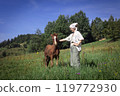 girl and foal 119772930