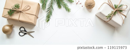 Eco friendly gift wrapping with kraft paper, pine branches, string, scissors, Christmas, sustainable concept 119115973