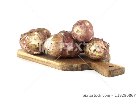 Fresh Jerusalem artichokes on wooden cutting board 119280867