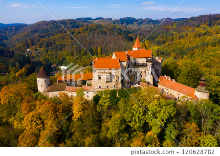 Medieval castle of Pernstein on a hill in the forest. South Moravian region.  120628782