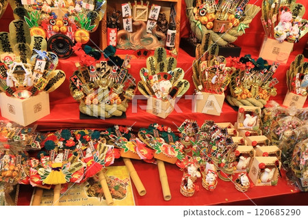 Tori-no-ichi: Auspicious rakes - A stall displaying auspicious rakes 120685290