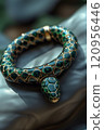 A detailed view of a wooden green snake bracelet on a persons hand, with copy space for text 120956446