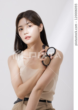 A woman posing with a blusher 120006093