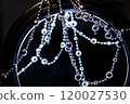 Crystal beads hanging disco garland shining on dark background. Christmas, New Year 2025 120027530