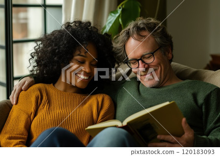 Woman and man sitting together on cozy couch 120183093