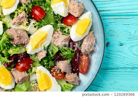 Canned Tuna salad with eggs and tomatoes photography . Top view 120269366